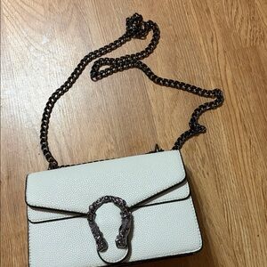 White Crossbody Bag with Decorative Chain and Buckle Accent